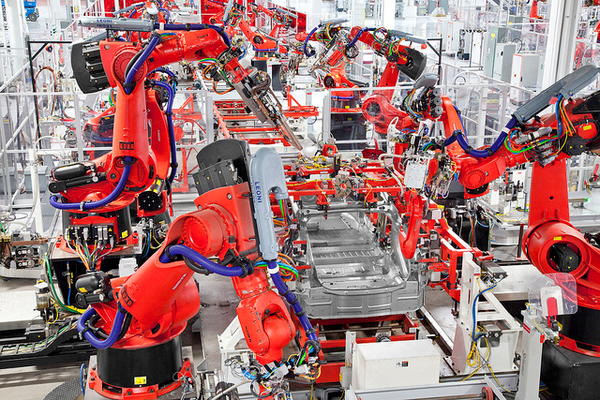 汽车业及装配生产线广泛应用机器人